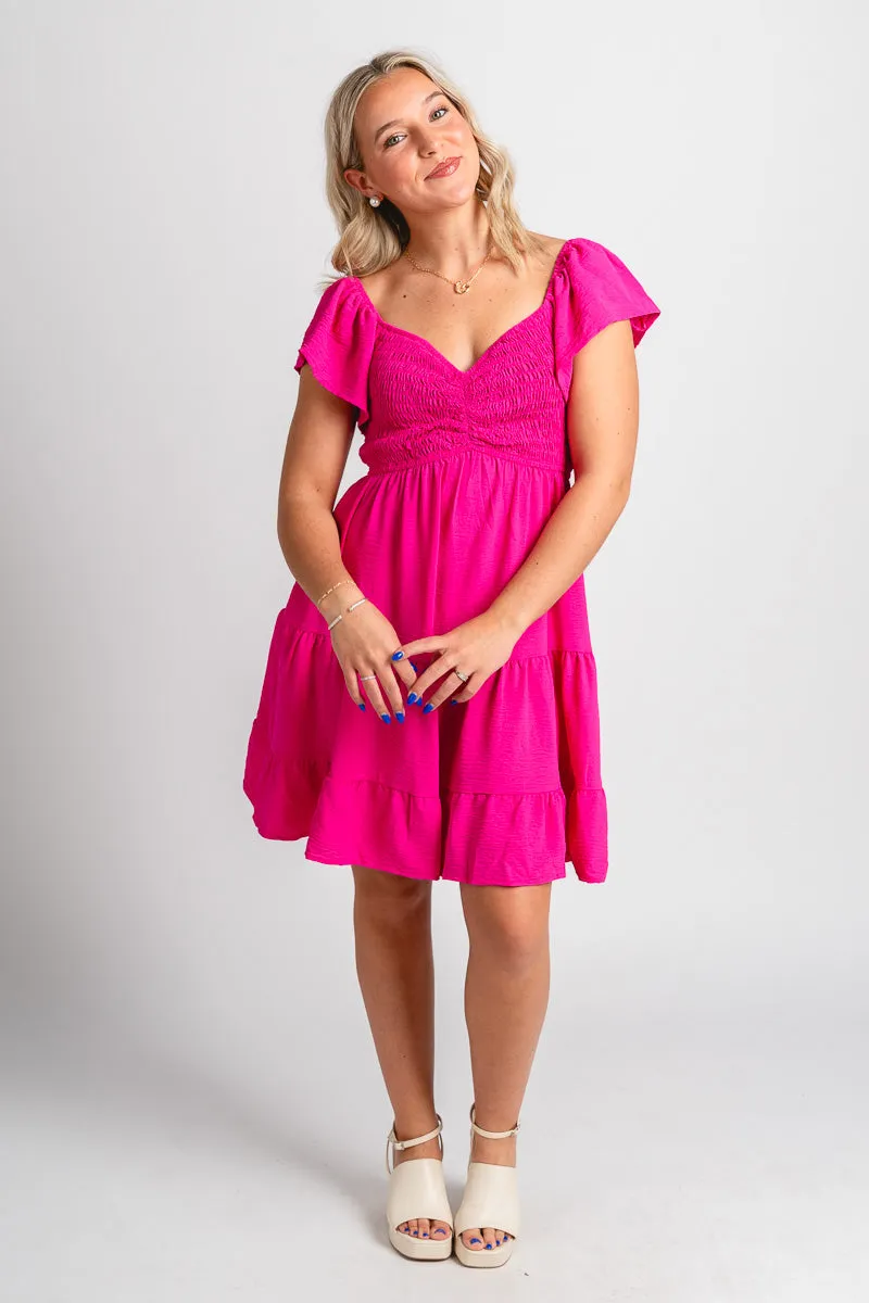 Smocked flutter sleeve dress hot pink